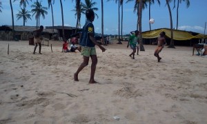 Playing footy at the beach Football games